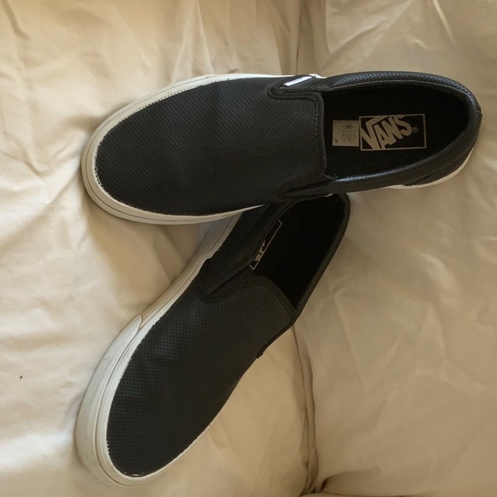Vans black slip ones